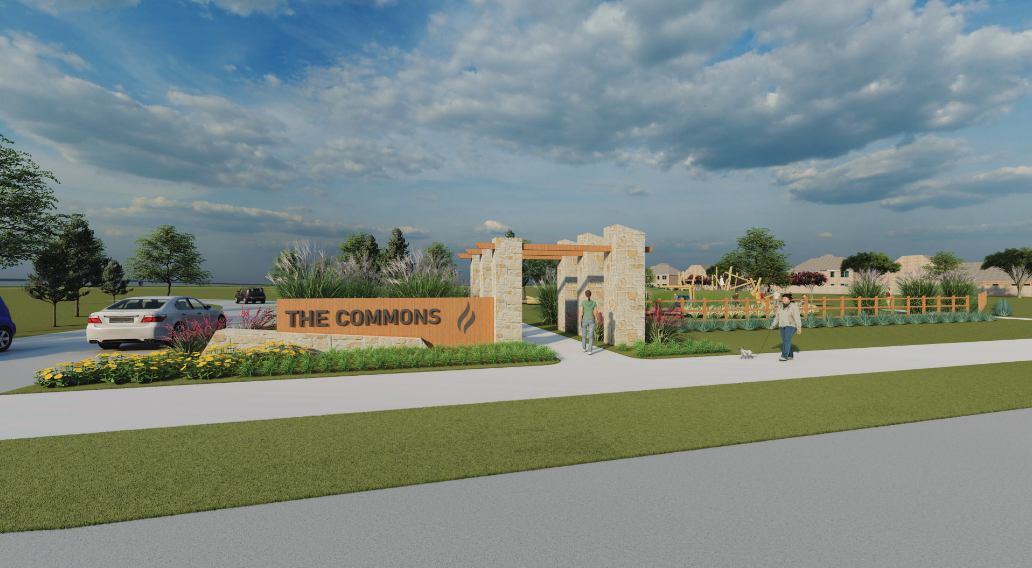 Entrance to "The Commons," featuring a stone archway and landscaping with a person walking a dog on a sidewalk nearby, showcasing beautiful new homes near Richmond.